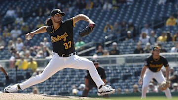 Sep 8, 2024; Pittsburgh, Pennsylvania, USA;  Pittsburgh Pirates starting pitcher Jared Jones (37) delivers a pitch against the Washington Nationals during the second inning at PNC Park. Mandatory Credit: Charles LeClaire-Imagn Images