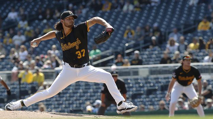 Sep 8, 2024; Pittsburgh, Pennsylvania, USA;  Pittsburgh Pirates starting pitcher Jared Jones (37) delivers a pitch against the Washington Nationals during the second inning at PNC Park. Mandatory Credit: Charles LeClaire-Imagn Images