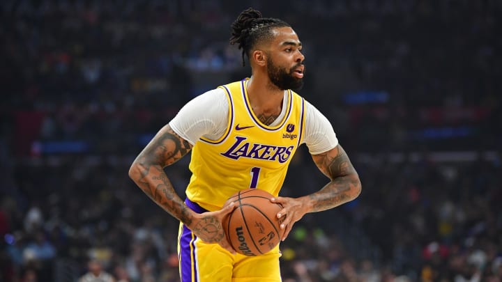 Feb 28, 2024; Los Angeles, California, USA; Los Angeles Lakers guard D'Angelo Russell (1) controls the ball against the Los Angeles Clippers during the first half at Crypto.com Arena. Mandatory Credit: Gary A. Vasquez-USA TODAY Sports