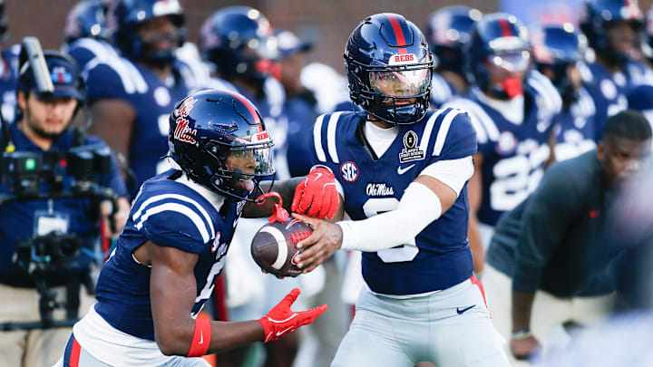 Dec 20, 2025; Oxford, MS, USA; Mississippi Rebels quarterback Trinidad Chambliss (6) and running back Kewan Lacy (5) warm up prior to a game against the Tulane Green Wave at Vaught-Hemingway Stadium. Mandatory Credit: Petre Thomas-Imagn Images