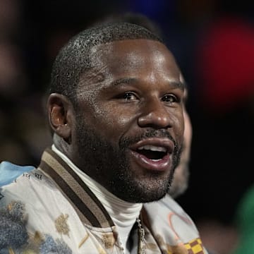 Dec 14, 2024; Las Vegas, Nevada, USA; Floyd Mayweather looks on during the first half between the Milwaukee Bucks and the Atlanta Hawks in a semifinal of the 2024 Emirates NBA Cup at T-Mobile Arena. Mandatory Credit: Kyle Terada-Imagn Images