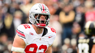 Nov 8, 2025; West Lafayette, Indiana, USA;  Ohio State Buckeyes defensive end Caden Curry (92) celebrates after making a play during the first quarter against the Purdue Boilermakers at Ross-Ade Stadium. Mandatory Credit: Marc Lebryk-Imagn Images