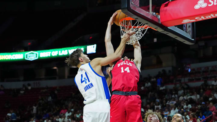 Jul 14, 2024; Las Vegas, NV, USA; Chicago Bulls forward Matas Buzelis (14) dunks against Golden State Warriors center Roman Sorkin (41) during the first quarter at Thomas & Mack Center. Mandatory Credit: Stephen R. Sylvanie-USA TODAY Sports