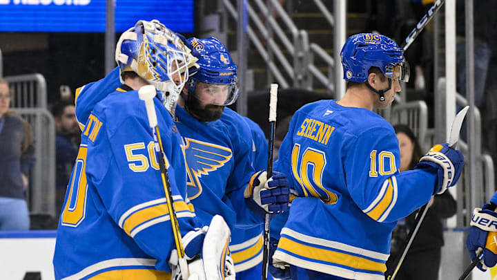 Apr 5, 2025; St. Louis, Missouri, USA; St. Louis Blues goaltender Jordan Binnington (50) and defenseman Nick Leddy (4) celebrate after the Blues won their franchise record 12th straight win after a victory over the Colorado Avalanche at Enterprise Center. Mandatory Credit: Jeff Curry-Imagn Images Apr 5, 2025; St. Louis, Missouri, USA; St. Louis Blues goaltender Jordan Binnington (50) and defenseman Nick Leddy (4) celebrate after the Blues won their franchise record 12th straight win after a victory over the Colorado Avalanche at Enterprise Center. Mandatory Credit: Jeff Curry-Imagn Images