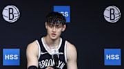 Sep 23, 2025; Brooklyn, NY, USA;  Brooklyn Nets forward Zeng Fanbo (12) speaks at Media Day. Mandatory Credit: Wendell Cruz-Imagn Images