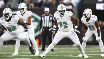 Terron Armstead announced Sunday that he will return to play left tackle under a restructured contract that will give the Dolphins some much needed cap relief.