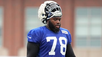 Jul 25, 2024; East Rutherford, NY, USA; New York Giants offensive tackle Andrew Thomas (78) takes a water break during training camp at Quest Diagnostics Training Center. Mandatory Credit: Lucas Boland-Imagn Images