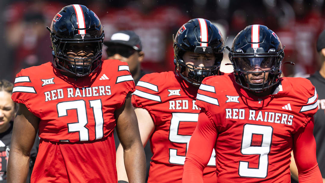 Texas Tech Red Raiders linebacker David Bailey (31) and Romello Height (9) against the Arizona State Sun Devils at Mountain America Stadium.