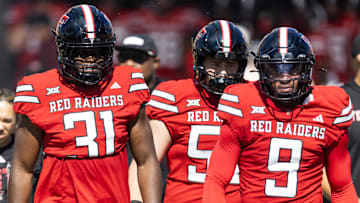 Texas Tech Red Raiders linebacker David Bailey (31) and Romello Height (9) against the Arizona State Sun Devils at Mountain America Stadium.