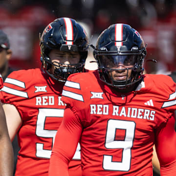 Texas Tech Red Raiders linebacker David Bailey (31) and Romello Height (9) against the Arizona State Sun Devils at Mountain America Stadium.