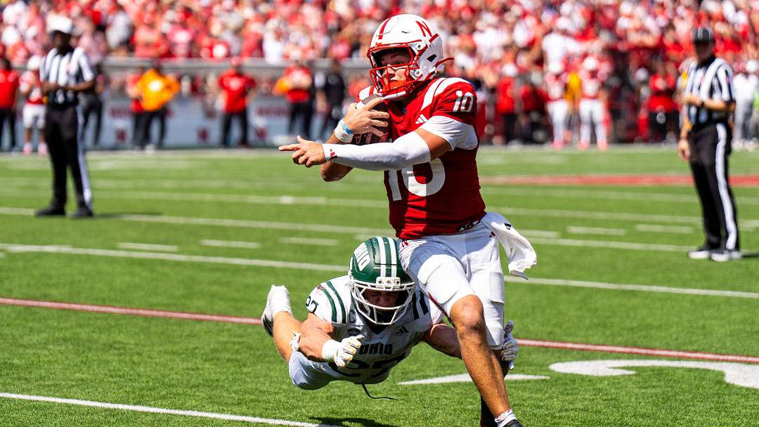 Sep 5, 2026; Lincoln, Nebraska, USA; Nebraska Cornhuskers quarterback Anthony Colandrea (10) runs for a touchdown against Ohio Bobcats linebacker Jack Fries (27) during the third quarter at Memorial Stadium. Credit: Dylan Widger- Sep 5, 2026; Lincoln, Nebraska, USA; Nebraska Cornhuskers quarterback Anthony Colandrea (10) runs for a touchdown against Ohio Bobcats linebacker Jack Fries (27) during the third quarter at Memorial Stadium. Credit: Dylan Widger-