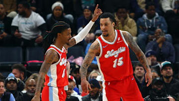 Jan 20, 2025; Memphis, Tennessee, USA; Memphis Grizzlies forward Brandon Clarke (15) reacts with guard Ja Morant (12) during the second quarter against the Minnesota Timberwolves at FedExForum. Mandatory Credit: Petre Thomas-Imagn Images