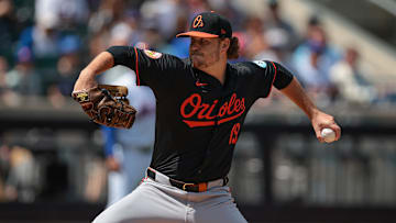Aug 21, 2024; New York City, New York, USA; Baltimore Orioles starting pitcher Cole Irvin (19) delivers a pitch during the first inning against the New York Mets at Citi Field. Mandatory Credit: Vincent Carchietta-Imagn Images