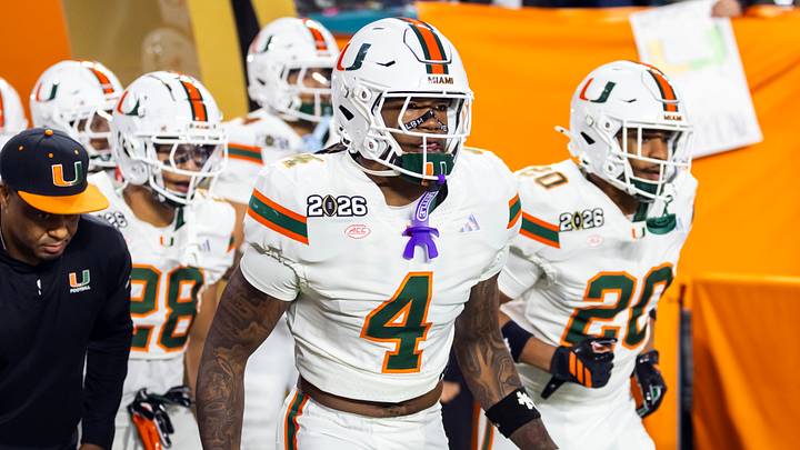 Jan 19, 2026; Miami Gardens, FL, USA; Miami Hurricanes running back Mark Fletcher Jr. (4) against the Indiana Hoosiers during the College Football Playoff National Championship game at Hard Rock Stadium. Mandatory Credit: Mark J. Rebilas-Imagn Images