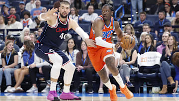 Nov 11, 2024; Oklahoma City, Oklahoma, USA; Oklahoma City Thunder forward Jalen Williams (8) drives around Los Angeles Clippers center Ivica Zubac (40) during the second quarter at Paycom Center. Mandatory Credit: Alonzo Adams-Imagn Images
