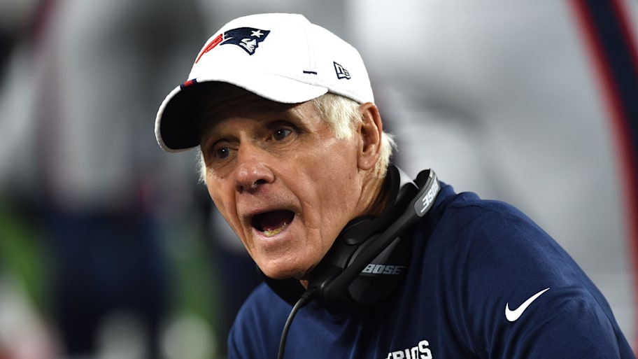 New England Patriots offensive line coach Dante Scarnecchia talks to his lineman during the second half of a preseason game.