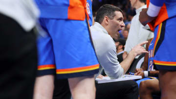 Thunder coach Mark Daigneault talks with his team during a timeout against the Kings on April 9 at Paycom Center.