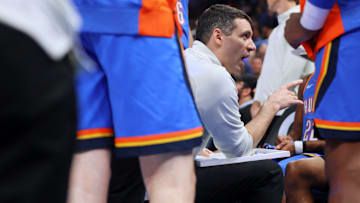 Thunder coach Mark Daigneault talks with his team during a timeout against the Kings on April 9 at Paycom Center.