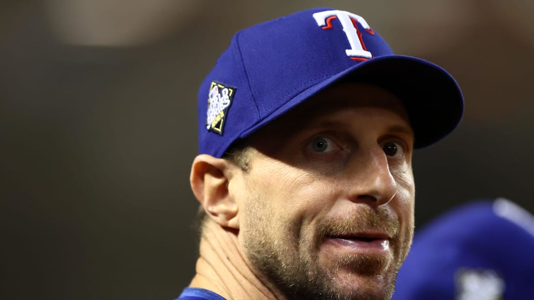 Oct 31, 2023; Phoenix, Arizona, USA; Texas Rangers injured pitcher Max Scherzer (31) watches the game from the dug out against the Arizona Diamondbacks during the eighth inning in game four of the 2023 World Series at Chase Field. Mandatory Credit: Mark J. Rebilas-USA TODAY Sports
