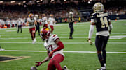 Dec 15, 2024; New Orleans, Louisiana, USA;  Washington Commanders wide receiver Terry McLaurin (17) celebrates a touchdown against the New Orleans Saints cornerback Kool-Aid McKinstry (14) during the first half at Caesars Superdome. Mandatory Credit: Matthew Hinton-Imagn Images