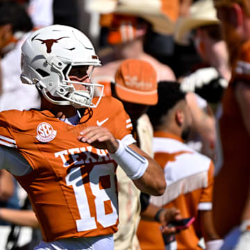 Manning may not have wowed in the box score, but he made some big-time plays in his first taste of the Red River Rivalry. 