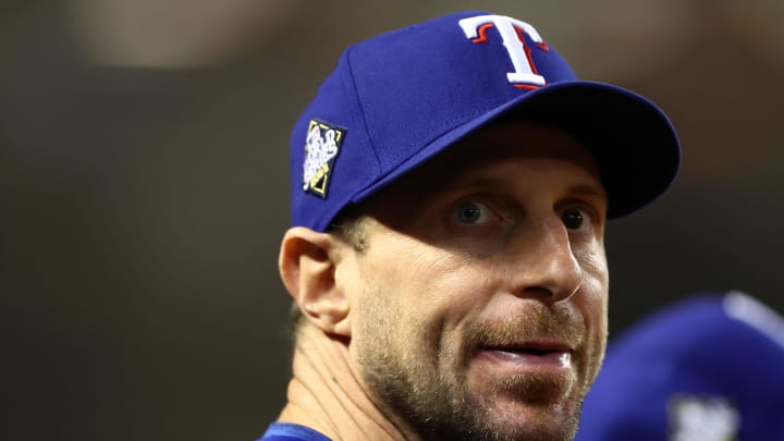 Oct 31, 2023; Phoenix, Arizona, USA; Texas Rangers injured pitcher Max Scherzer (31) watches the game from the dug out against the Arizona Diamondbacks during the eighth inning in game four of the 2023 World Series at Chase Field. Mandatory Credit: Mark J. Rebilas-USA TODAY Sports