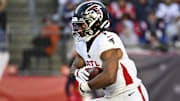 Nov 2, 2025; Foxborough, Massachusetts, USA;  Atlanta Falcons running back Bijan Robinson (7) runs the ball against the New England Patriots during the third quarter at Gillette Stadium. Mandatory Credit: Eric Canha-Imagn Images