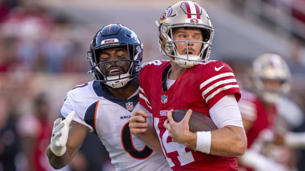 Denver Broncos rush linebacker Jonathon Cooper sacks San Francisco 49ers quarterback Sam Darnold.