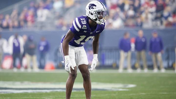 Dec 26, 2024; Phoenix, AZ, USA; Kansas State Wildcats safety VJ Payne (19) against the Rutgers Scarlet Knights during the Rate Bowl at Chase Field. Mandatory Credit: Mark J. Rebilas-Imagn Images