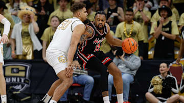 Houston graduate forward J'Wan Roberts (right)