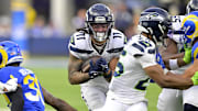 Jan 5, 2025; Inglewood, California, USA; Seattle Seahawks wide receiver Jaxon Smith-Njigba (11) runs the ball in the first half against the Los Angeles Rams at SoFi Stadium.