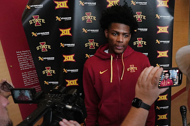 Iowa State men’s basketball player Dominick Nelson talks to media in June.