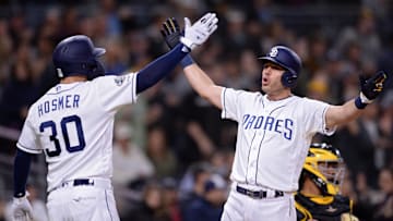 May 16, 2019; San Diego, CA, USA; San Diego Padres second baseman Ian Kinsler (right) is congratulated by first baseman Eric Hosmer (30) after hitting a three-run home run during the sixth inning against the Pittsburgh Pirates at Petco Park. Mandatory Credit: Orlando Ramirez-Imagn Images