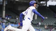 Apr 7, 2024; Chicago, Illinois, USA; Chicago Cubs outfielder Cody Bellinger (24) hits a home run against the Los Angeles Dodgers during the sixth inning at Wrigley Field.