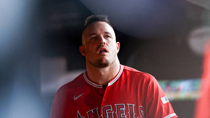 West Sacramento, California, USA;  Los Angeles Angels designated hitter Mike Trout (27) looks on from the dugout during the third inning against the Athletics at Sutter Health Park.  Mandatory Credit: Sergio Estrada-Imagn Images