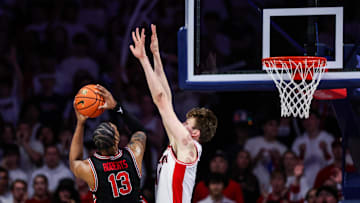 Feb 15, 2025; Tucson, Arizona, USA; Arizona Wildcats forward Henri Veesaar (13) attempts to block a shot made by Houston Cougars forward J’Wan Roberts (13) during the second half at McKale Center. Mandatory Credit: Aryanna Frank-Imagn Images