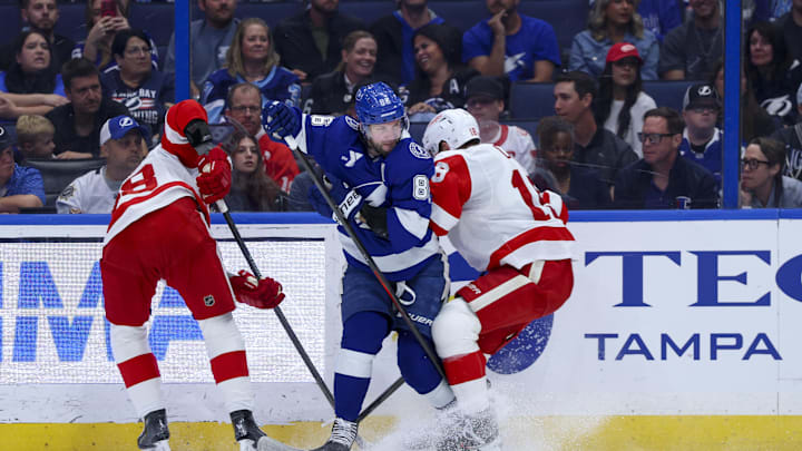 Apr 13, 2026; Tampa, Florida, USA; Tampa Bay Lightning right wing Nikita Kucherov (86) and Detroit Red Wings center Andrew Copp (18) battle for the puck in the third period at Benchmark International Arena. Mandatory Credit: Nathan Ray Seebeck-Imagn Images Apr 13, 2026; Tampa, Florida, USA; Tampa Bay Lightning right wing Nikita Kucherov (86) and Detroit Red Wings center Andrew Copp (18) battle for the puck in the third period at Benchmark International Arena. Mandatory Credit: Nathan Ray Seebeck-Imagn Images