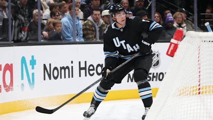 Oct 24, 2024; Salt Lake City, Utah, USA; Utah Hockey Club defenseman Michael Kesselring (7) looks to pass the puck against the Colorado Avalanche during the first period at Delta Center. Mandatory Credit: Rob Gray-Imagn Images Oct 24, 2024; Salt Lake City, Utah, USA; Utah Hockey Club defenseman Michael Kesselring (7) looks to pass the puck against the Colorado Avalanche during the first period at Delta Center. Mandatory Credit: Rob Gray-Imagn Images