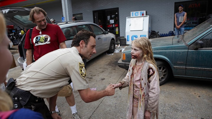Andrew Lincoln, Addy Miller and Greg Nicotero - Photo Credit: Scott Garfield/AMC