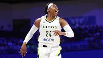 Jul 17, 2024; Arlington, Texas, USA; Dallas Wings guard Arike Ogunbowale (24) reacts during the game against the Indiana Fever at College Park Center. Mandatory Credit: Kevin Jairaj-Imagn Images