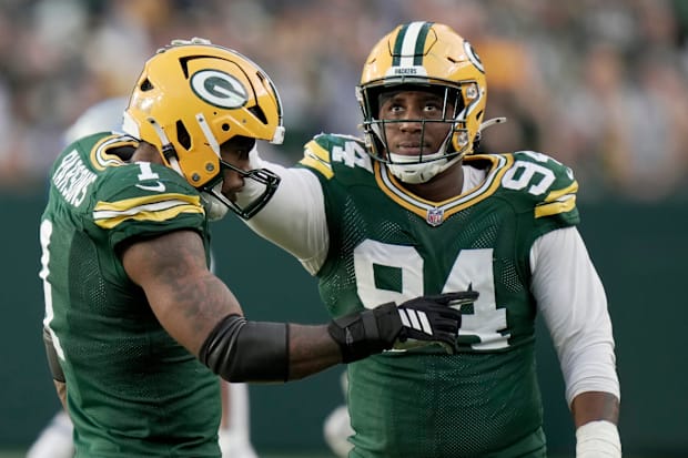 Green Bay Packers defensive end Karl Brooks (94) is shown with defensive end Micah Parsons against Detroit in Week 1.