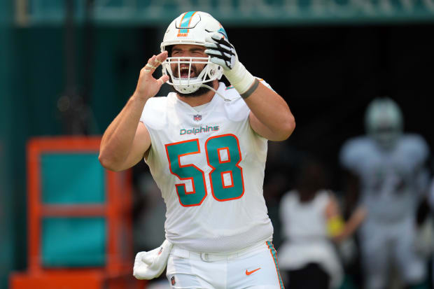 Miami Dolphins guard Connor Williams (58) takes the field before the opening game of the season.