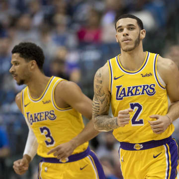 Jan 7, 2019; Dallas, TX, USA; Los Angeles Lakers guard Josh Hart (3) and guard Lonzo Ball (2) run back up court during the first quarter against the Dallas Mavericks at the American Airlines Center. Mandatory Credit: Jerome Miron-USA TODAY Sports