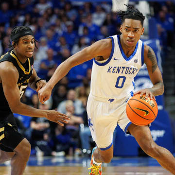 Mar 6, 2024; Lexington, Kentucky, USA;  Kentucky Wildcats guard Rob Dillingham (0) drives to the basket during the second half against the Vanderbilt Commodores at Rupp Arena at Central Bank Center. Mandatory Credit: Jordan Prather-USA TODAY Sports