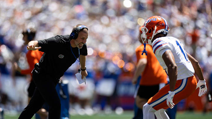Florida Gators head coach Billy Napier celebrates with Florida Gators wide receiver Aidan Mizell (11) after a touchdown during the first half at the Orange and Blue spring football game at Steve Spurrier Field at Ben Hill Griffin Stadium in Gainesville, FL on Saturday, April 13, 2024. [Matt Pendleton/Gainesville Sun]