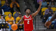 Feb 6, 2024; Laramie, Wyoming, USA; New Mexico Lobos guard Donovan Dent (2) calls out a play against the Wyoming Cowboys during the second half at Arena-Auditorium. Mandatory Credit: Troy Babbitt-Imagn Images