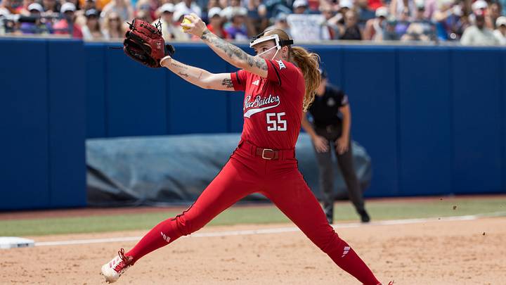 May 30, 2026; Oklahoma City, OK, USA;  Texas Tech Red Raiders pitcher Kaitlyn Terry (55) throws a pitch in the first inning against the Tennessee Lady Volunteers  during the NCAA Women’s College World Series at Devon Park. Mandatory Credit: Brett Rojo-Imagn Images