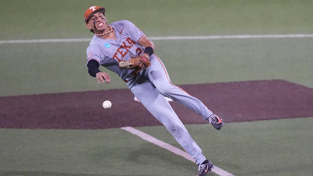 Texas Longhorns shortstop Adrian Rodriguez delivers a throw to first during the Austin Super Regional against the Oregon Ducks.