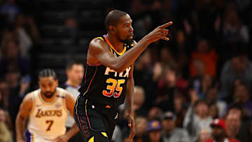Nov 26, 2024; Phoenix, Arizona, USA; Phoenix Suns forward Kevin Durant (35) against the Los Angeles Lakers during an NBA Cup game at Footprint Center. Mandatory Credit: Mark J. Rebilas-Imagn Images