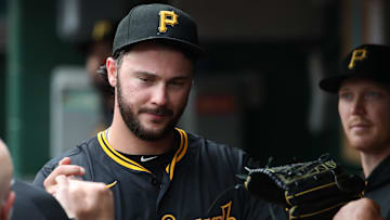 Jun 8, 2025; Pittsburgh, Pennsylvania, USA; Pittsburgh Pirates starting pitcher Paul Skenes (30) celebrates in the dugout after pitching 7 2/3 innings without surrendering an earned run against the Philadelphia Phillies during the eighth inning at PNC Park. Mandatory Credit: Charles LeClaire-Imagn Images